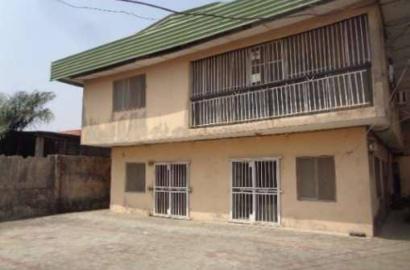 FOR SALE @ SATELLITE TOWN :  A Storey building consists of :  5br flat + 3br flat + 2br flat + 2no of 1br apartments, Security house on  640sqm