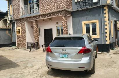 For Sale  A story building on a full plot of land