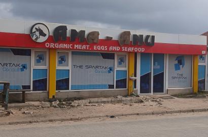 URGENT SALE Commercial 4 bedrooms bungalow with big shop