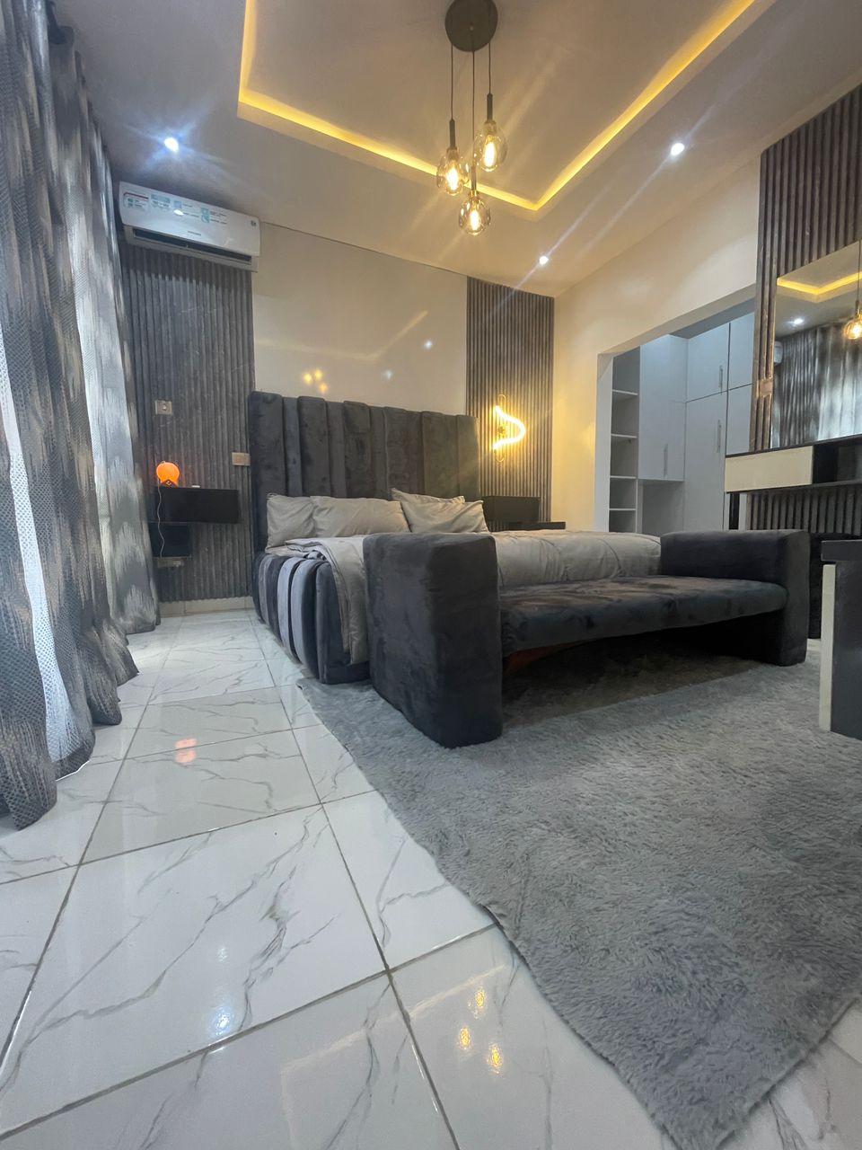 Shortlet  Cozy 2 bedroom Terrace Duplex with swimming pool and a Study room (3 bedrooms)