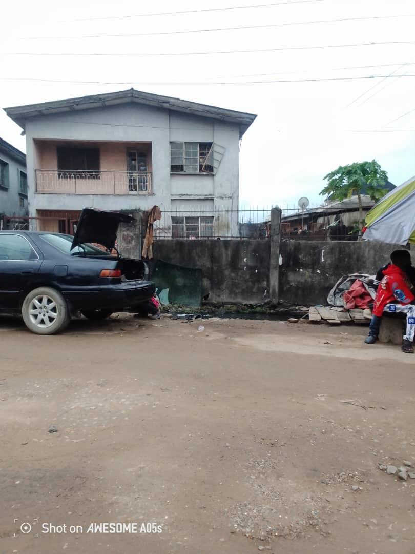 FOR SALE A story building(delapitated) empty building,at Ramlat timson street aguda surulere