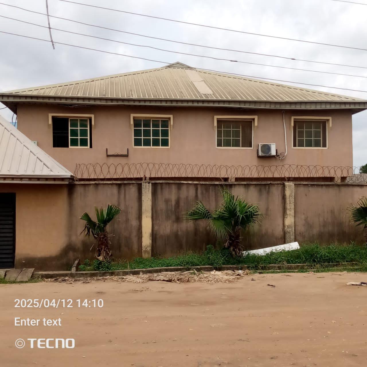 For Sale: A black of 4 flats of 3bedroom flats very close to main Rd at BUCKNOR ESTATE, Isolo